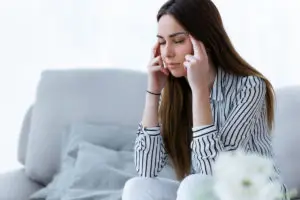 Young woman with anxiety seeking counselling and therapy