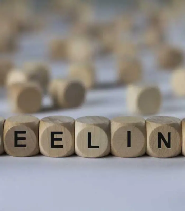 feeling - cube with letters, sign with wooden cubes