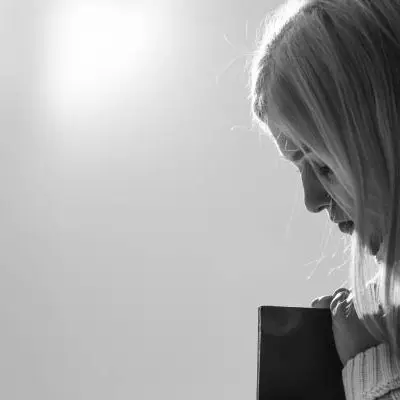 Woman in deep thought.